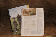 The new 2020 combined hunting regulation booklet lays on a deer hide.