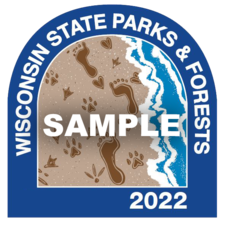 Wisconsin state park sticker illustration with human and animal footprints in the sand next to water