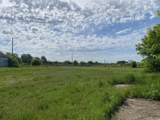 An image of a former agricultural cooperative on the north side of the City of Bloomer, Wisconsin. 