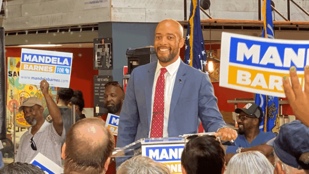 Picture of Dem governor candidate Mandela Barnes standing before a crowd of supporters during his U.S. Senate campaign in 2021.