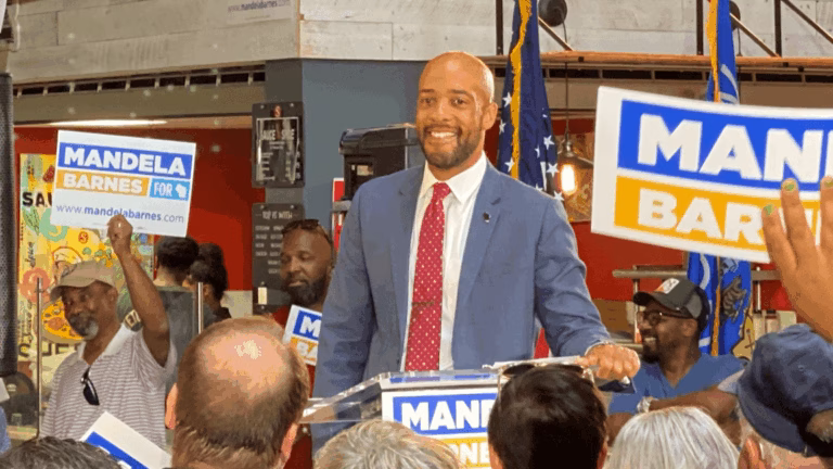 Picture of Dem governor candidate Mandela Barnes standing before a crowd of supporters during his U.S. Senate campaign in 2021.