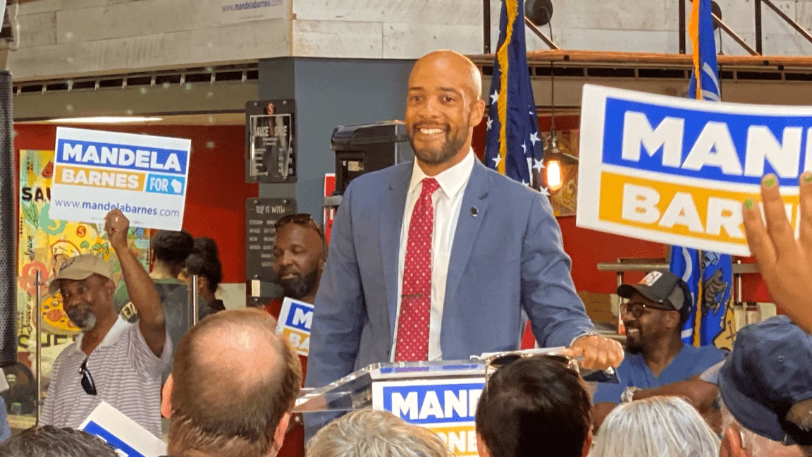 Picture of Dem governor candidate Mandela Barnes standing before a crowd of supporters during his U.S. Senate campaign in 2021.