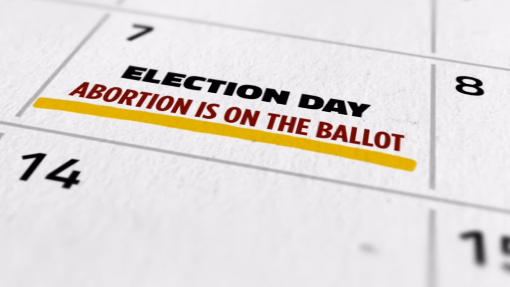 Thid screenshot from an ad for Supreme Court candidate Judge Chris Taylor shows a calendar with the text "Election Day. Abortion is on the ballot."