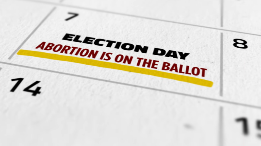 Thid screenshot from an ad for Supreme Court candidate Judge Chris Taylor shows a calendar with the text "Election Day. Abortion is on the ballot."