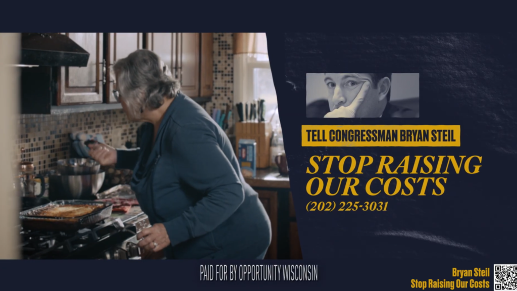 Screenshot from Opportunity Wisconsin ad showing a woman making lasagna. Next to her is text urging viewer to tell U.S. Rep. Bryan Steil to "stop raising our costs."