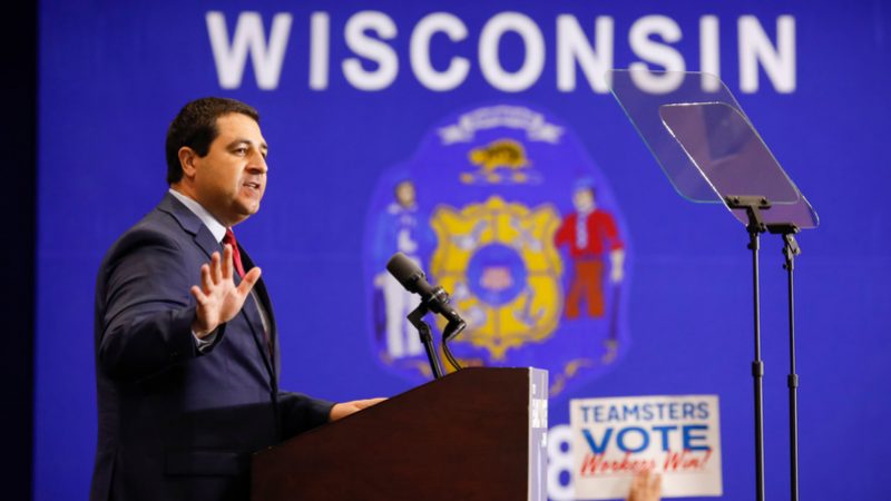 Attorney General Josh Kaul speaks at a Wisconsin Democrats campaign rally featuring former President Barack Obama, at North Division High School in Milwaukee on Saturday, Oct. 29, 2022. Photo by Ruthie Hauge, The Capital Times.