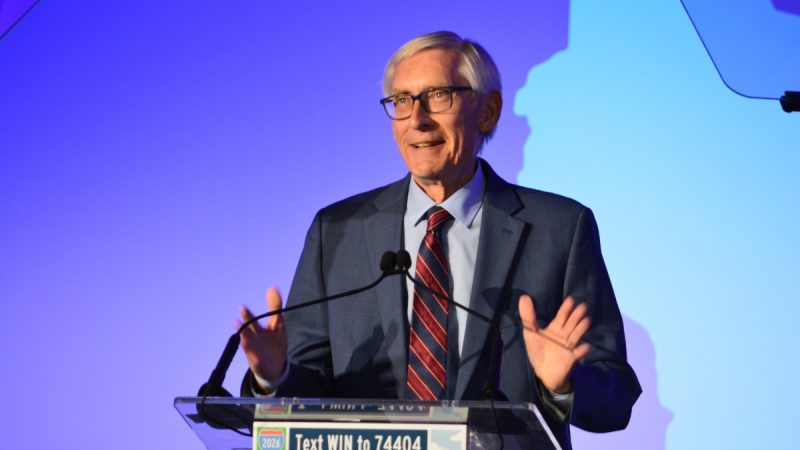 Wisconsin Gov. Tony Evers addresses the 2025 Dem Party state convention. Photo by Kate Morton.