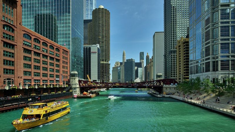 Tour boat on the Chicago River in downtown Chicago, the largest city in Illinois and (as of 2020) third-largest in the United States. Photo courtesy of the Carol M. Highsmith Archive, Library of Congress.
