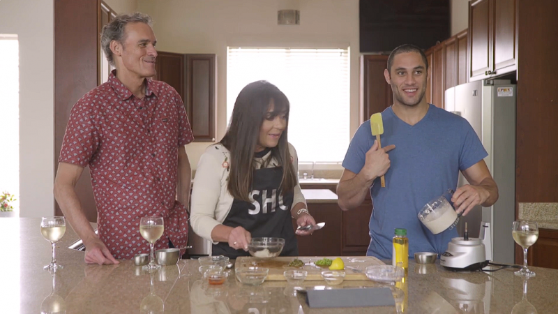 YouTube screenshot of an episode of "Sexy Healthy Cooking" featuring hosts former UW La Crosse Chancellor Joe Gow and his wife, Carmen Wilson, with adult film performer Damon Dice.