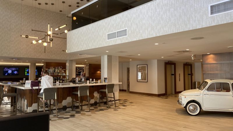 As guests walk into the newly renovated hotel, check-in is on the right and The Hub (pictured here) is on the left.