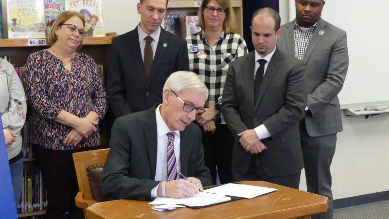 Gov. Tony Evers vetoes a Republican tax cut package at Lincoln Elementary School in Wauwatosa on Feb. 26, 2020. Photo by David Wise.