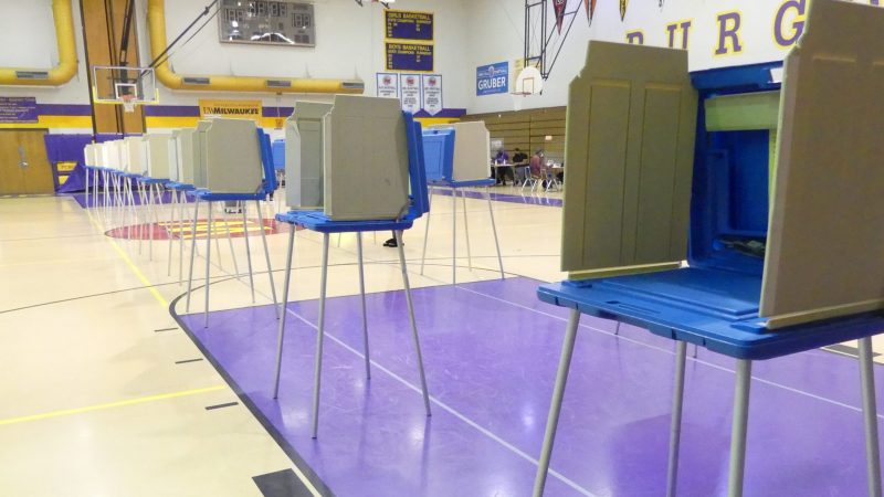 Despite empty booths at Washington High School in Milwaukee's Sherman Park neighborhood on the city's north side, poll workers say they saw light, but steady turnout, but no lines by mid-afternoon on Election Day 2020. Photo by David Wise, Nov. 3, 2020.
