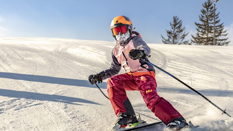 Masked skier at Wilmot Mountain Resort/https://www.wilmotmountain.com/