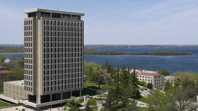 View of Van Hise Hall and Picnic Point in Lake Mendota on the University of Wisconsin-Madison campus, seen from atop Van Vleck Hall.